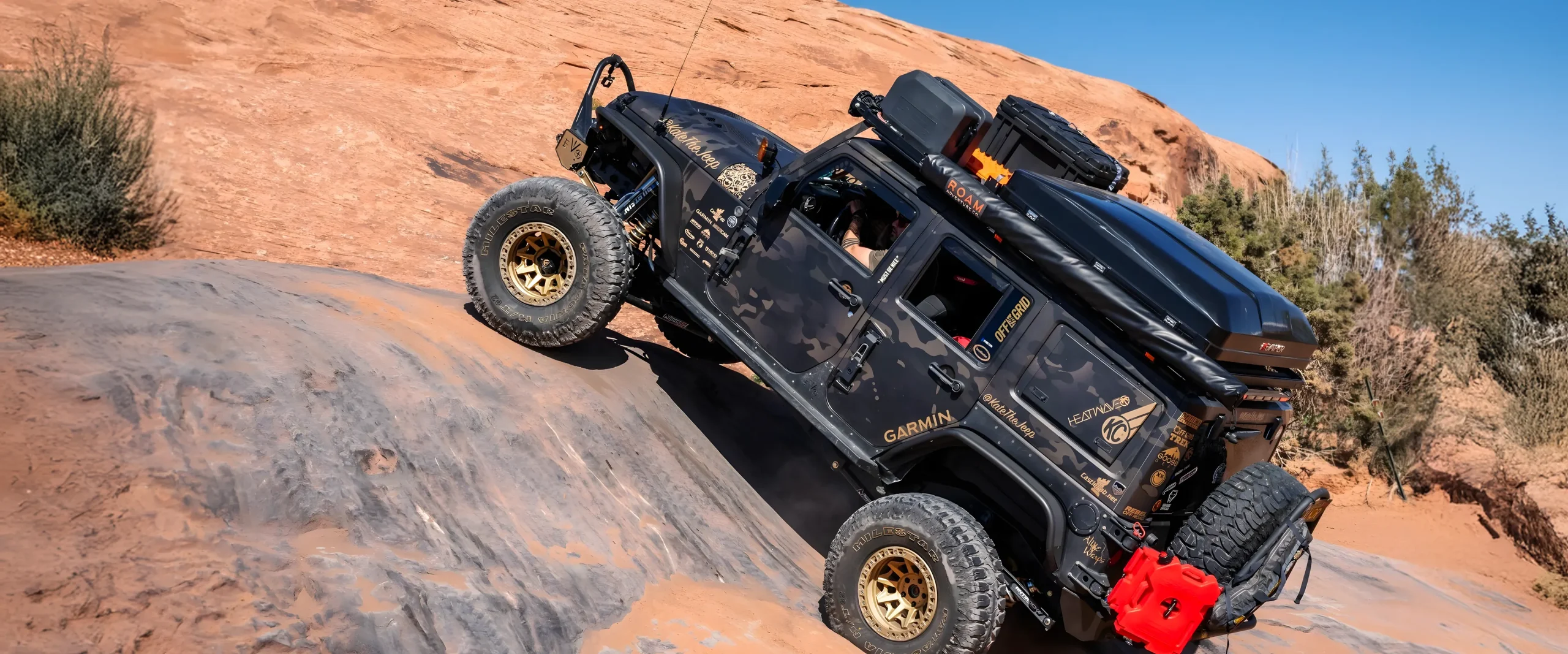 Multicam-black-jeep-crawling