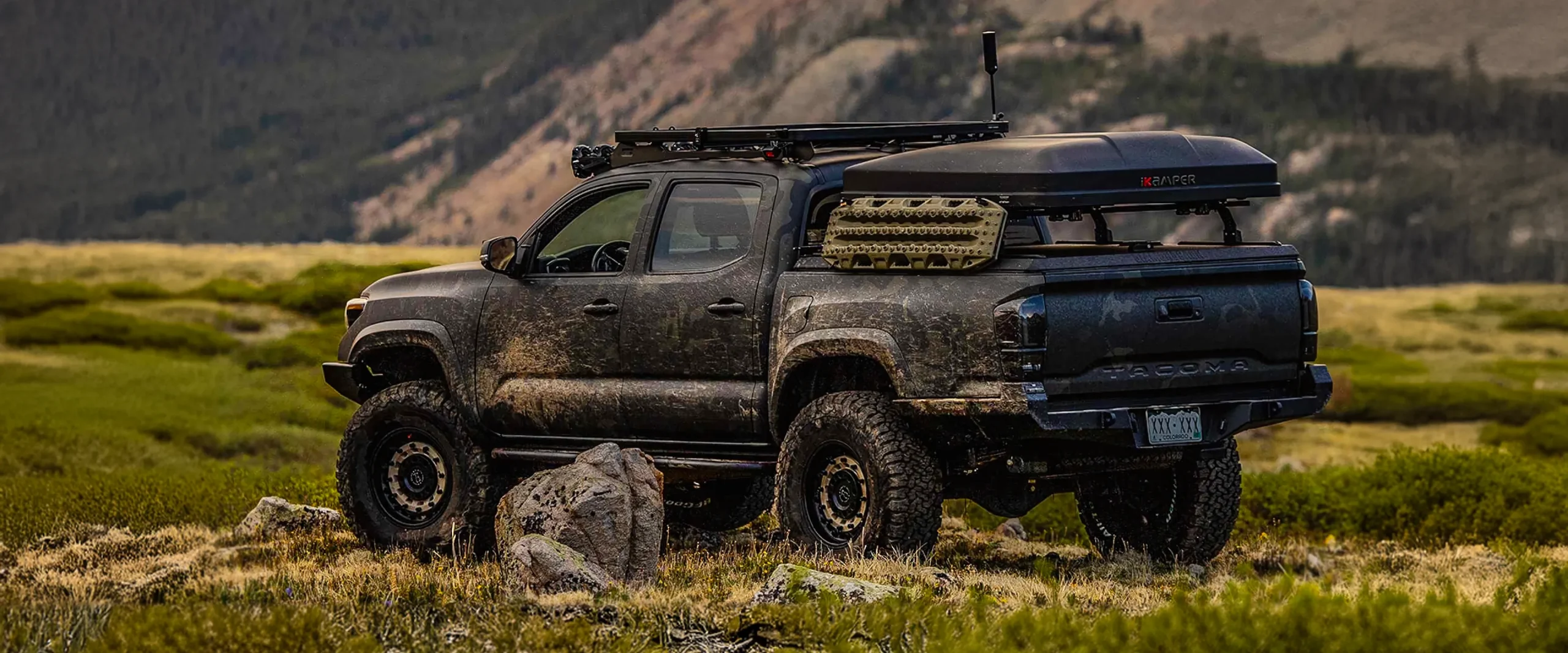 Multicam-black-tacoma-offroad-dirty