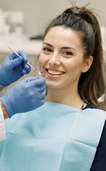 Patient receiving dental care from a dentist